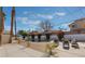 Backyard pool with slide, lounge seating, and lush landscaping on a sunny day at 2909 Gilmary Ave, Las Vegas, NV 89102