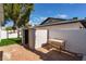 Backyard shed near a landscaped yard featuring a garden plot at 2909 Gilmary Ave, Las Vegas, NV 89102
