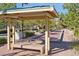 Bocce court with covered seating area, perfect for outdoor recreation and relaxation at 3179 Mura Del Prato Ave, Henderson, NV 89044