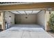 Spacious two-car garage featuring painted walls, and a clean concrete floor at 3179 Mura Del Prato Ave, Henderson, NV 89044