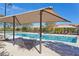 Resort-style pool with lounge chairs and shaded seating, ideal for relaxation at 3179 Mura Del Prato Ave, Henderson, NV 89044