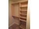 Walk-in closet with shelving and clothing rods at 3208 Regal Swan Pl # 3, North Las Vegas, NV 89084