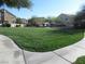 Well-maintained green space in common area, perfect for relaxing outdoors at 3208 Regal Swan Pl # 3, North Las Vegas, NV 89084