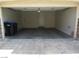 Two car garage featuring ample room and storage space, plus access door at 3208 Regal Swan Pl # 3, North Las Vegas, NV 89084
