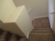 Carpeted staircase with a handrail at 3208 Regal Swan Pl # 3, North Las Vegas, NV 89084