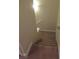 Carpeted staircase with a handrail at 3208 Regal Swan Pl # 3, North Las Vegas, NV 89084