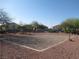 Community sand volleyball court with covered picnic areas and seating at 3208 Regal Swan Pl # 3, North Las Vegas, NV 89084