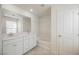 Well-lit bathroom with double vanity, shower-tub combo, white cabinets and bright lighting at 3270 Trabia Ave, Henderson, NV 89044