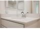 Modern bathroom vanity with a white countertop and chrome faucet, perfect for a clean, contemporary look at 3270 Trabia Ave, Henderson, NV 89044