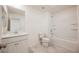 Bright bathroom featuring a single sink vanity, tile flooring, and a shower-tub combination at 3270 Trabia Ave, Henderson, NV 89044