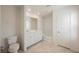Bright bathroom with a double sink vanity and a shower-tub combo at 3270 Trabia Ave, Henderson, NV 89044
