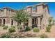 Charming two-story home with a well-manicured front yard, offering curb appeal and a welcoming entrance at 3270 Trabia Ave, Henderson, NV 89044