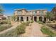 Charming two-story home with desert landscaping and inviting front entrance in a modern community at 3270 Trabia Ave, Henderson, NV 89044