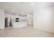 Modern kitchen with white cabinets, stainless steel appliances, and a large center island, great for cooking at 3270 Trabia Ave, Henderson, NV 89044