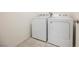 Laundry area featuring a white washing machine and dryer at 3270 Trabia Ave, Henderson, NV 89044
