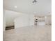 Bright living room with tile floors and staircase, offering a spacious and modern living space at 3270 Trabia Ave, Henderson, NV 89044