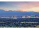 Panoramic city skyline view featuring iconic hotels and casinos at sunset at 383 Solitude Peak Ln, Henderson, NV 89012