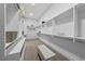 Walk-in closet with built-in shelving, ample storage, and a center bench at 383 Solitude Peak Ln, Henderson, NV 89012