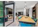 Open-concept dining room with access to living room and patio, allowing for seamless entertainment at 383 Solitude Peak Ln, Henderson, NV 89012