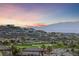 Panoramic view of the golf course and city, with modern homes at 383 Solitude Peak Ln, Henderson, NV 89012