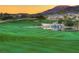 Lush green golf course with a picturesque pond and waterfall feature offer a tranquil view at 383 Solitude Peak Ln, Henderson, NV 89012
