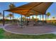 Playground with shade, slides, and climbing structures ensures fun for all in a park-like setting at 383 Solitude Peak Ln, Henderson, NV 89012