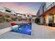 A modern pool and patio area for outdoor relaxation and luxurious living at 383 Solitude Peak Ln, Henderson, NV 89012