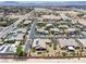 Aerial view of the neighborhood with a single-story house, desert landscaping, and solar panels at 3906 Jacob Lake Cir, Las Vegas, NV 89118