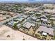 Aerial view of a neighborhood street showing a home with landscaping, driveway and solar panels at 3906 Jacob Lake Cir, Las Vegas, NV 89118