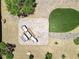 Aerial view of a backyard patio featuring comfortable outdoor seating and beautifully landscaped surroundings at 3906 Jacob Lake Cir, Las Vegas, NV 89118