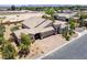 Well-kept single-story house with desert landscaping, brick driveway, and solar panels at 3906 Jacob Lake Cir, Las Vegas, NV 89118
