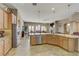 Open kitchen featuring a large island, stainless steel appliances, and easy access to the living area at 3906 Jacob Lake Cir, Las Vegas, NV 89118