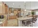 Spacious kitchen with granite countertops, wooden cabinets, and stainless steel appliances at 3906 Jacob Lake Cir, Las Vegas, NV 89118