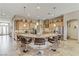 Spacious kitchen featuring a large center island with seating, stainless steel appliances, and recessed lighting at 3906 Jacob Lake Cir, Las Vegas, NV 89118