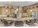 Bright kitchen features a large island with seating, stainless steel appliances, and ample cabinet space at 3906 Jacob Lake Cir, Las Vegas, NV 89118