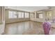 Open living room with shuttered windows, recessed lighting, and decorative niches at 3906 Jacob Lake Cir, Las Vegas, NV 89118