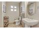 Stylish powder room with a unique vanity and modern fixtures at 3906 Jacob Lake Cir, Las Vegas, NV 89118