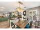 Open kitchen with an adjacent dining area and modern appliances at 3950 Candleglow Ct, Las Vegas, NV 89147