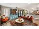 Open-concept living area features a cozy seating area, fireplace, large area rug and lots of decor at 3950 Candleglow Ct, Las Vegas, NV 89147