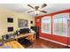 Inviting home office with modern desk setup, lots of natural light and comfortable workspace at 3950 Candleglow Ct, Las Vegas, NV 89147