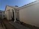 Exterior shot showing front entrance with white pillar and doorway at 4607 Chestnut Blaze Dr, North Las Vegas, NV 89032