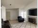Comfortable living room showcasing neutral paint, recessed entertainment center, and a plush area rug at 4607 Chestnut Blaze Dr, North Las Vegas, NV 89032