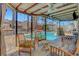 Inviting backyard with pool, covered patio, and comfortable outdoor seating at 5019 Lancaster Dr, Las Vegas, NV 89120