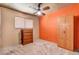 Cozy bedroom with modern ceiling fan, closet, and dresser at 5019 Lancaster Dr, Las Vegas, NV 89120