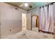 Bedroom featuring unique ceiling design, neutral carpet, and partial mirrored closet doors at 5019 Lancaster Dr, Las Vegas, NV 89120