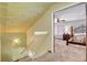 Upstairs hallway with carpet and view into a bedroom at 5019 Lancaster Dr, Las Vegas, NV 89120
