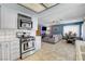 Open concept kitchen with gas range and eat-in dining area at 5019 Lancaster Dr, Las Vegas, NV 89120