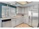 Charming kitchen with stainless steel appliances and ample counter space at 5019 Lancaster Dr, Las Vegas, NV 89120
