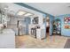 Well-lit kitchen featuring stainless steel appliances, ample counter space, and tile flooring at 5019 Lancaster Dr, Las Vegas, NV 89120