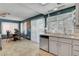 Bright kitchen and dining area with views out to backyard pool at 5019 Lancaster Dr, Las Vegas, NV 89120